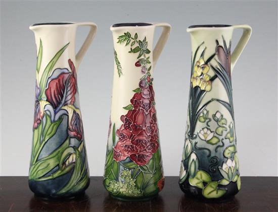 Three Moorcroft cylindrical ewers in Limia, Iris and Foxglove patterns, 1995-2002(-)